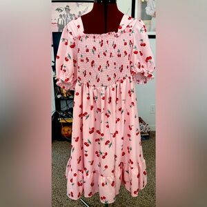 Cute Pink cherry dress just right for casual wear.